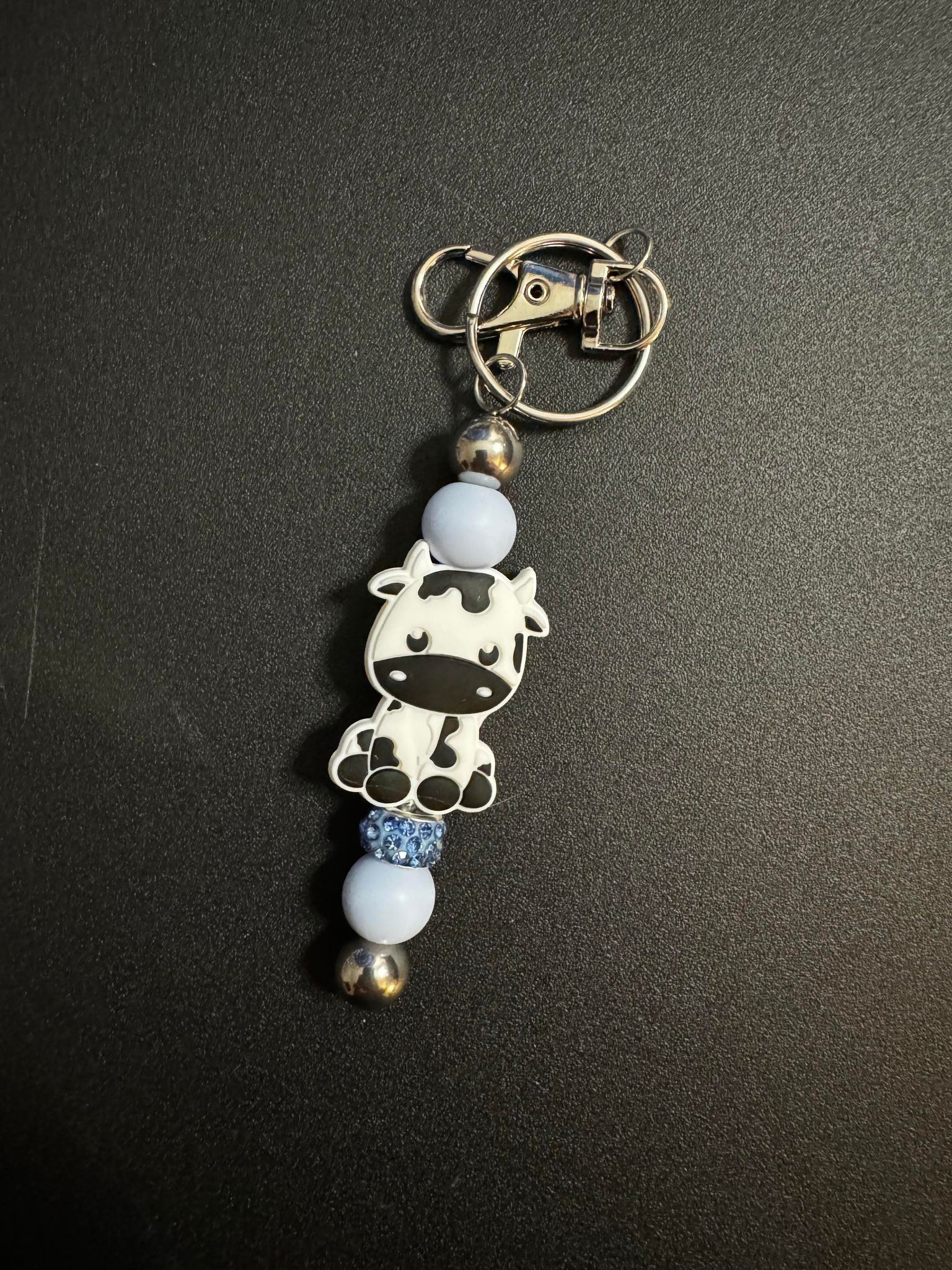 Black Cow with Blue Sparkle Beaded Keychain