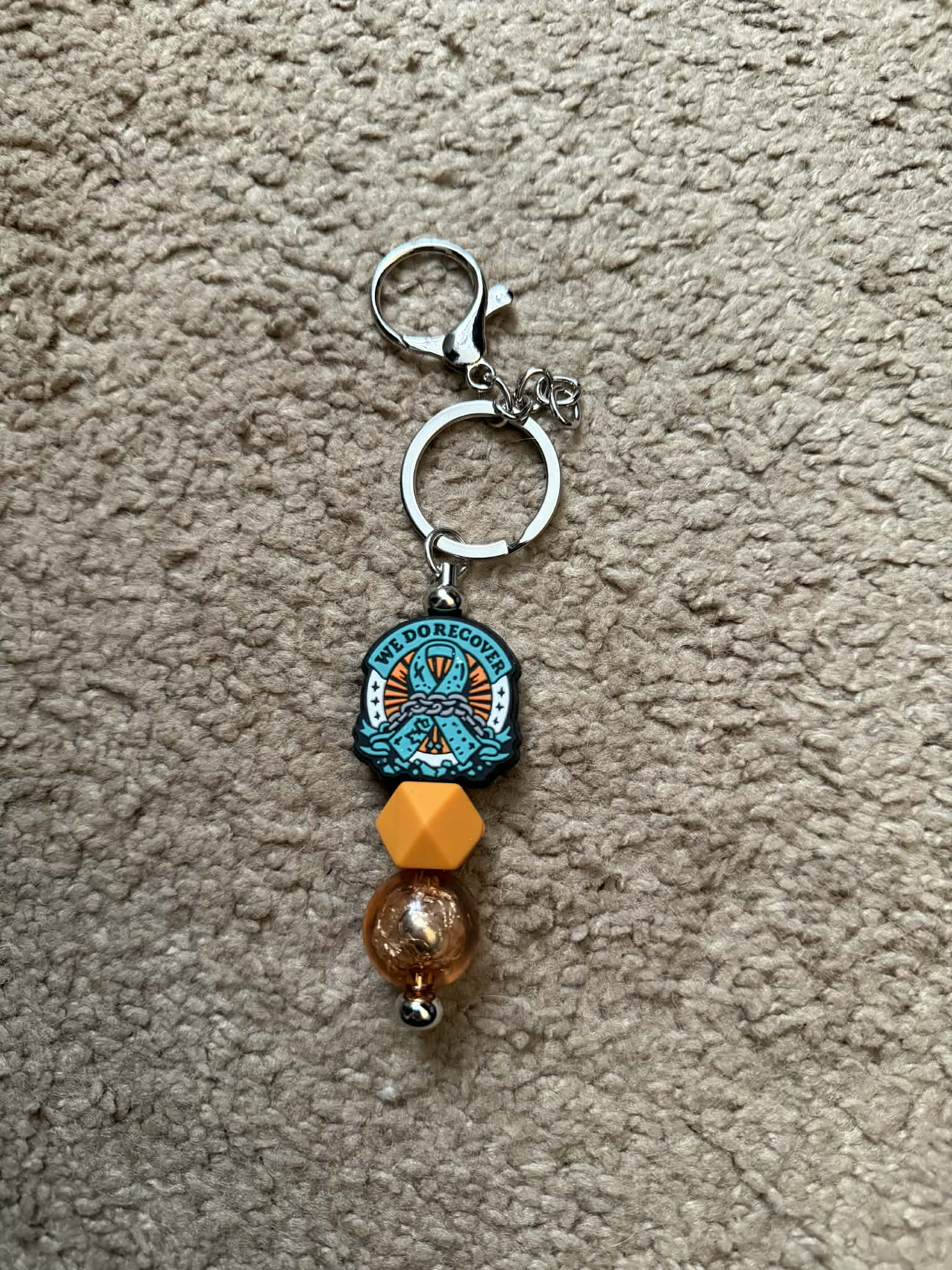 We Do Recover Beaded Keychain