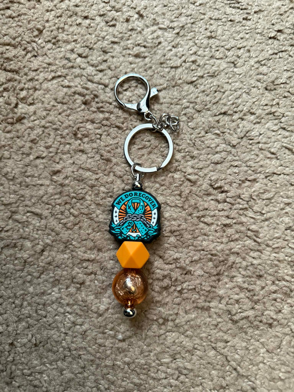 We Do Recover Beaded Keychain