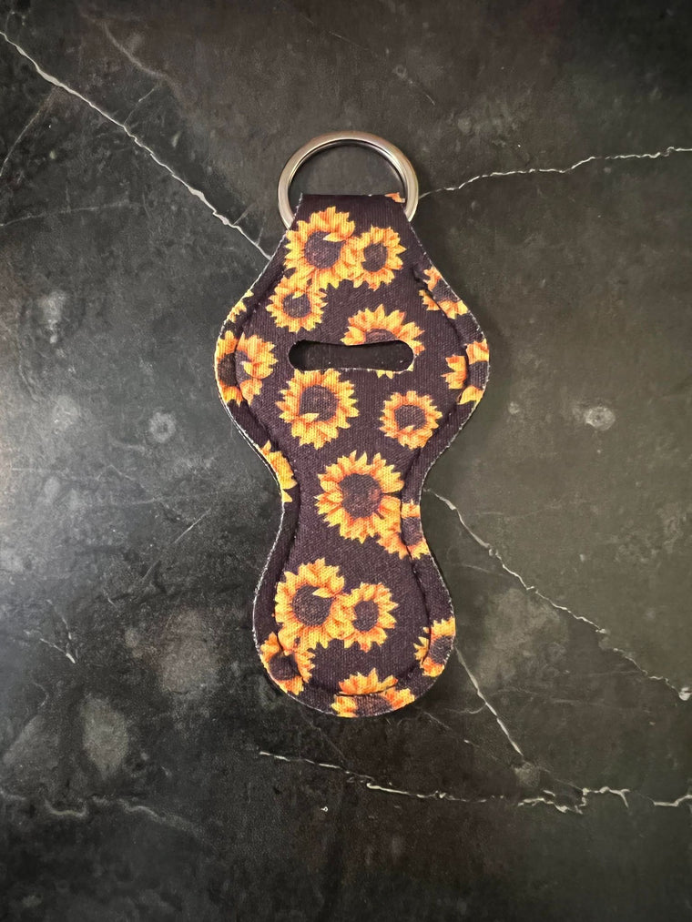 Black Background Sunflower Chapstick Holder Keychain