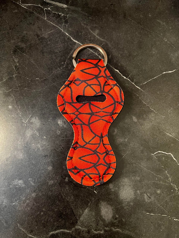 Black and Orange Aztec Chapstick Holder Keychain